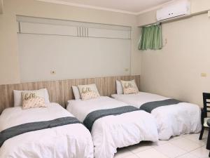 A bed or beds in a room at Chia Yun Homestay