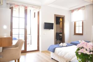 Μια τηλεόραση ή/και κέντρο ψυχαγωγίας στο Pure Diamond Hotel