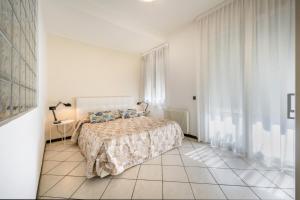Appartamenti Mare Caorle客房内的一张或多张床位