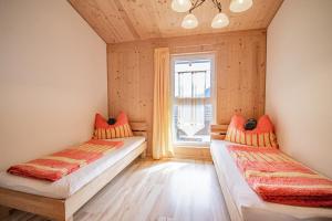 Ένα ή περισσότερα κρεβάτια σε δωμάτιο στο Gschnitzerhof
