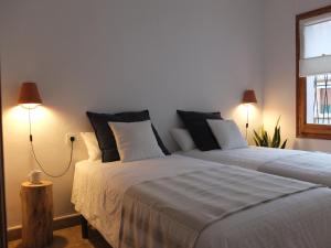 Posteľ alebo postele v izbe v ubytovaní Entre Pinos P1 Beach Apartment