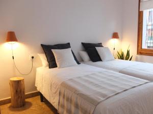 Posteľ alebo postele v izbe v ubytovaní Entre Pinos P1 Beach Apartment