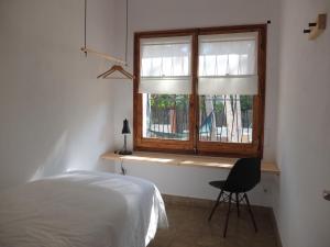 Posteľ alebo postele v izbe v ubytovaní Entre Pinos P1 Beach Apartment