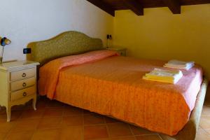 Letto o letti in una camera di ANTICO FRANTOIO