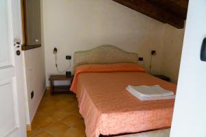 Letto o letti in una camera di ANTICO FRANTOIO