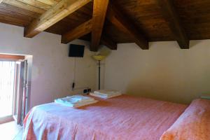 Letto o letti in una camera di ANTICO FRANTOIO