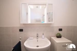 Kúpeľňa v ubytovaní Central Suite Moniga