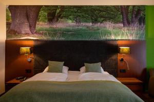 Postel nebo postele na pokoji v ubytování Boshotel - Vlodrop, Roermond