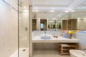 a bathroom with a sink and a shower at GDhouse in Venice