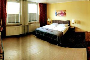 Postel nebo postele na pokoji v ubytování Altstadt Appartement Goslar