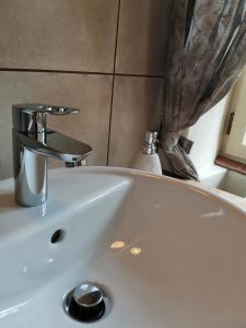 Kúpeľňa v ubytovaní Apartmány U Koudelníka