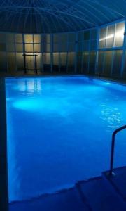 Bazén v ubytování casa relax nudista nebo v jeho okolí
