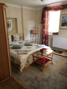 Postel nebo postele na pokoji v ubytování Vila Kost