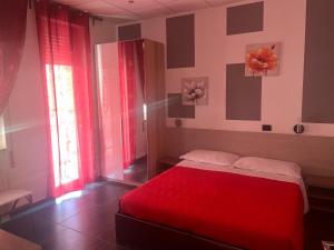Postel nebo postele na pokoji v ubytování B&B Adriatico