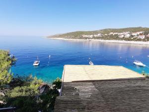 a view of a body of water with boats in it at Apartment MojMir 1 in Zavalatica