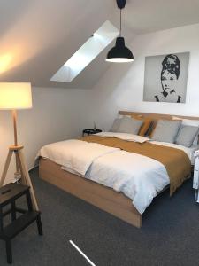 A bed or beds in a room at Mymara 19