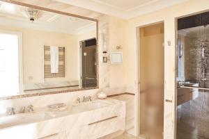 a bathroom with a sink and a mirror at Splendido, A Belmond Hotel, Portofino in Portofino