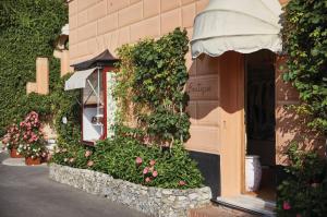 a building with flowers on the side of it at Splendido, A Belmond Hotel, Portofino in Portofino