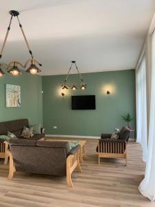 TV a/nebo společenská místnost v ubytování Villa Flora