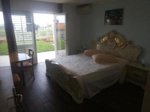 Postel nebo postele na pokoji v ubytování Guest House Vila Luka