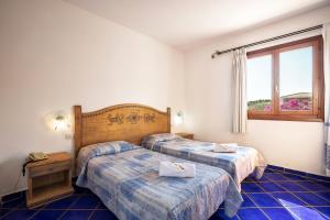 Postel nebo postele na pokoji v ubytování Hotel Bonsai