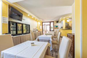 TV a/nebo společenská místnost v ubytování Hotel Bonsai