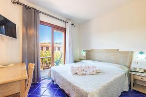 Postel nebo postele na pokoji v ubytování Hotel Bonsai