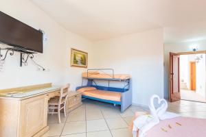 TV a/nebo společenská místnost v ubytování Hotel Bonsai