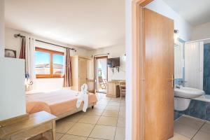 Postel nebo postele na pokoji v ubytování Hotel Bonsai