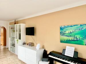 TV a/nebo společenská místnost v ubytování Haus Belli
