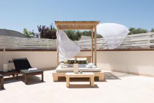 En terrasse eller udendørsområde på Residenza Il Sole