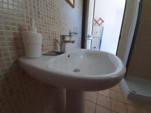 Koupelna v ubytování Osteria B&B Il Rifugio