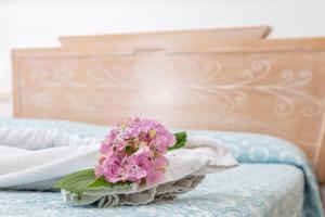 Postel nebo postele na pokoji v ubytování Hotel Bonsai