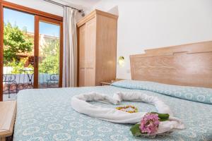 Postel nebo postele na pokoji v ubytování Hotel Bonsai