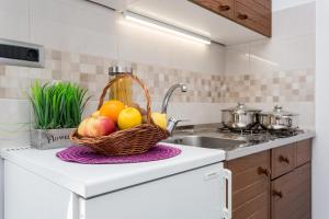 Kuchyň nebo kuchyňský kout v ubytování Apartments Anna I + 15 fotografií