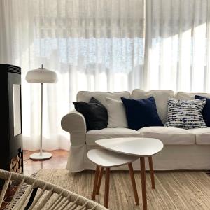 A seating area at Casa Blanca Beach Apartment
