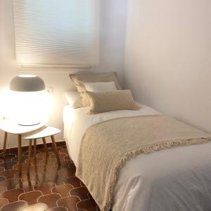Postel nebo postele na pokoji v ubytování Casa Blanca Beach Apartment + 13 fotografií