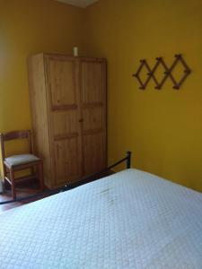 A bed or beds in a room at Appartamento il Giglio Még 2 kép