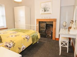 Llit o llits en una habitació de Mill Cottage