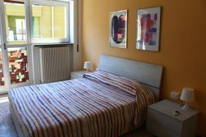 Posteľ alebo postele v izbe v ubytovaní Appartamento Il Sogno
