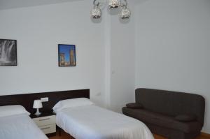 Postel nebo postele na pokoji v ubytování Rural Reillo Alojamientos Rurales