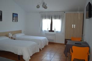 Postel nebo postele na pokoji v ubytování Rural Reillo Alojamientos Rurales