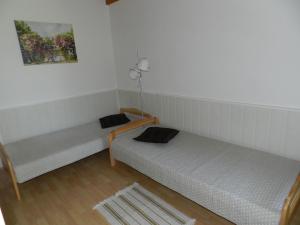 Voodi või voodid majutusasutuse Penzion Lukov toas