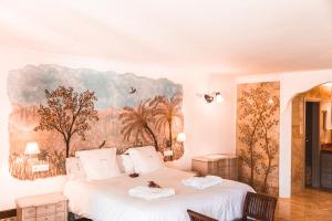 Un ou plusieurs lits dans un hébergement de l'établissement Hotel Finca Ca N'ai - Adults Only