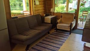 Posezení v ubytování Intsikurmu veski saunamaja - sauna inclusive
