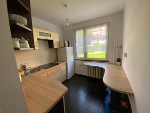 Kuchyňa alebo kuchynka v ubytovaní APARTAMENT MARTYNKA + 4 fotografie