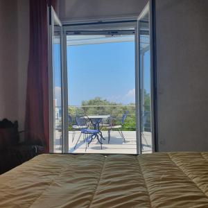 Postel nebo postele na pokoji v ubytování Σγουρής (Sgouris)