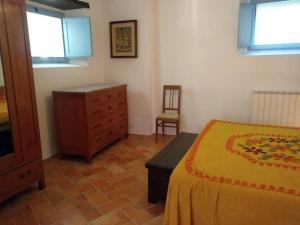 Ένα ή περισσότερα κρεβάτια σε δωμάτιο στο Casa dei ciliegi