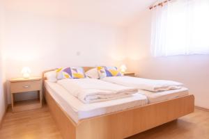 Postel nebo postele na pokoji v ubytování Steko Accomodations