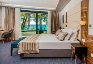 Postel nebo postele na pokoji v ubytování Hotel Eden